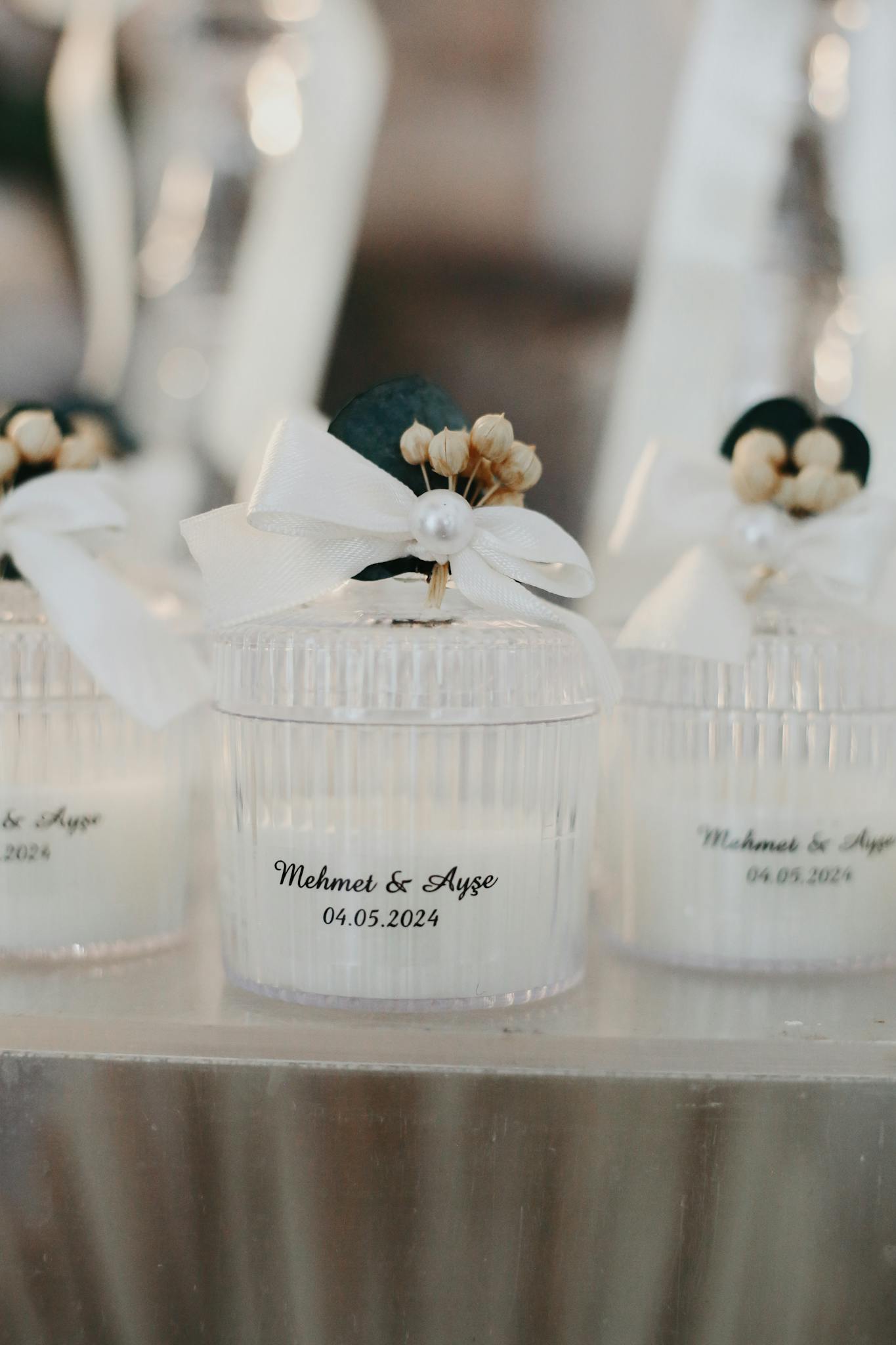 Elegant personalized white candle gift with ribbon and pearl accent — perfect for weddings, proposals, and Valentine’s Day gifts in Singapore